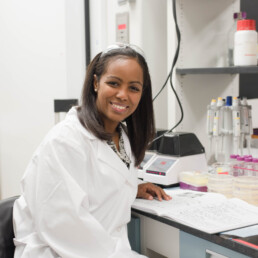 professor lydia contreras sitting in lab